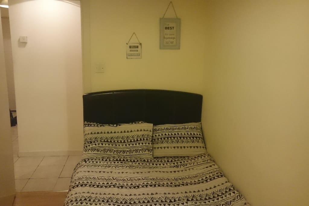 The same single room with double bed from another angle.
