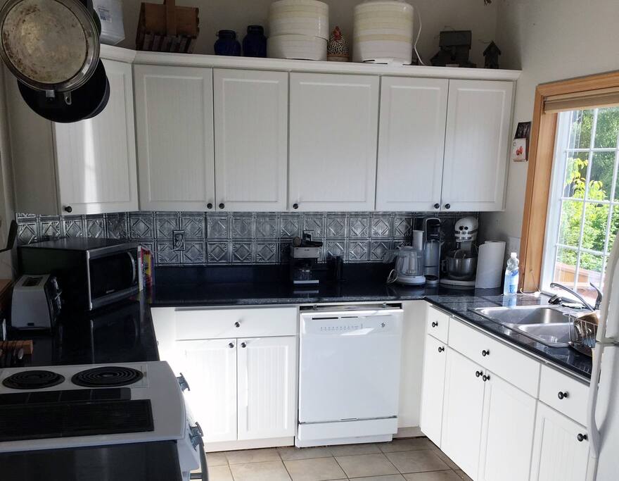 The kitchen is bright and has everything you need!