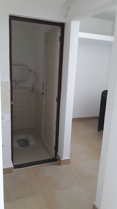 Bathroom and next to it kitchen