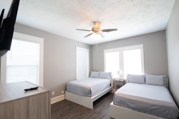 2nd Bedroom with two full beds that boast memory foam toppers