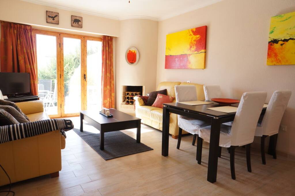 Lounge/dining area with TV (Sky, Xbox 360 Connect), DVDs, games, leather sofas, dining table (6 people), extendable coffee table, double doors opening to private garden