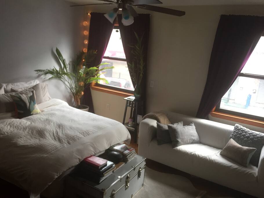 incredibly well lit and comfortable - bed and sitting area