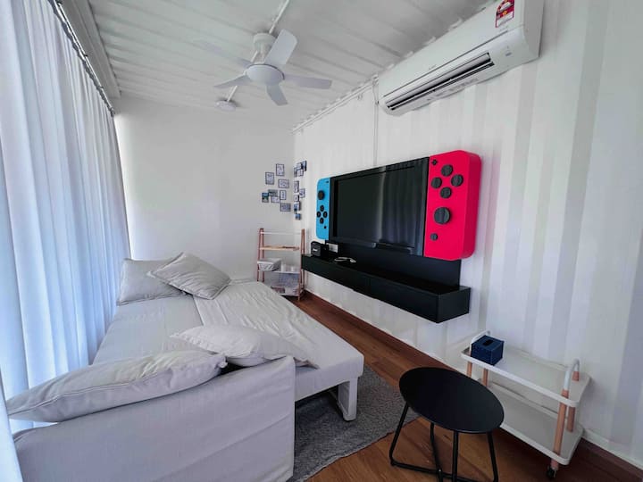 Sofa bed in the living room, can accommodate 2 pax. One mattress can be added at RM80 per set