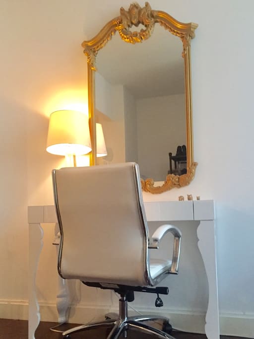 Charming desk can be used for work-time or as a vanity to get ready for a fun night out on the town!