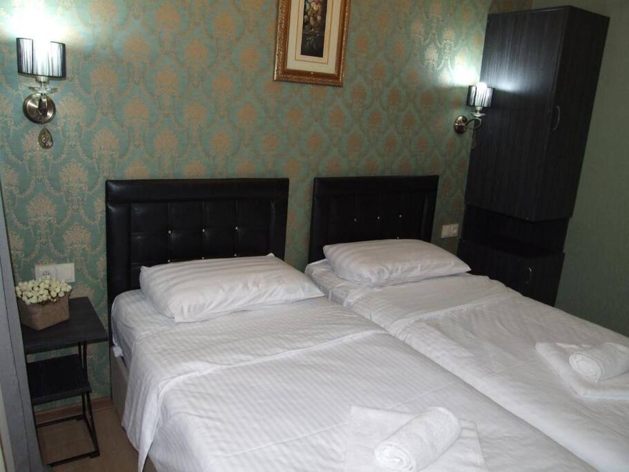 Twin room with separate bathroom