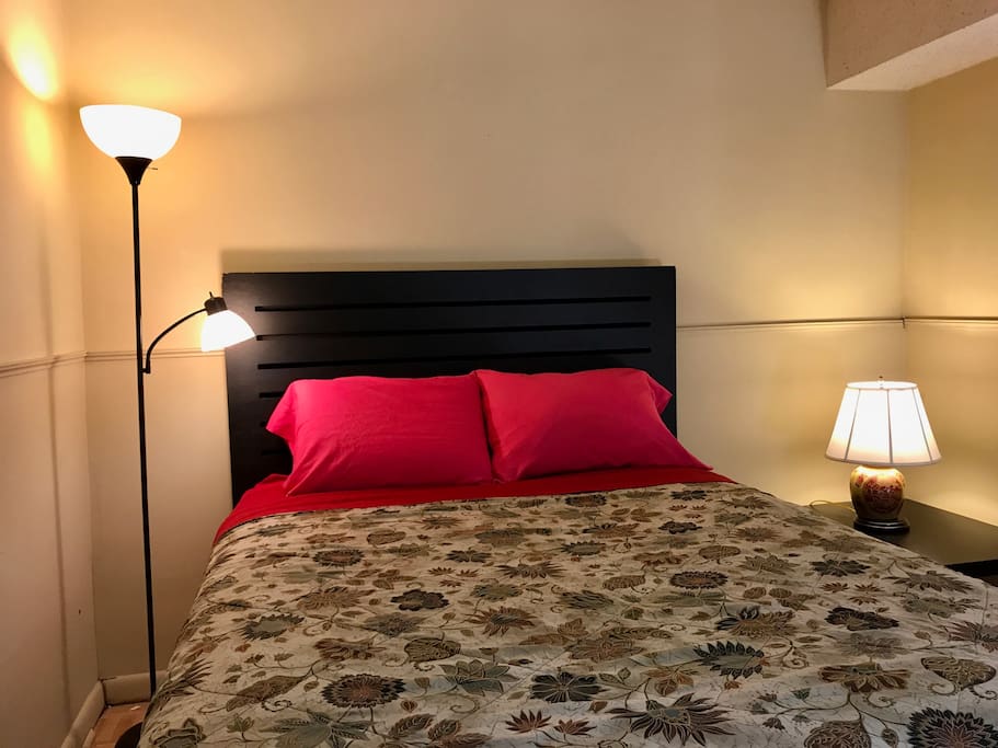 The room has queen size comfortable bed