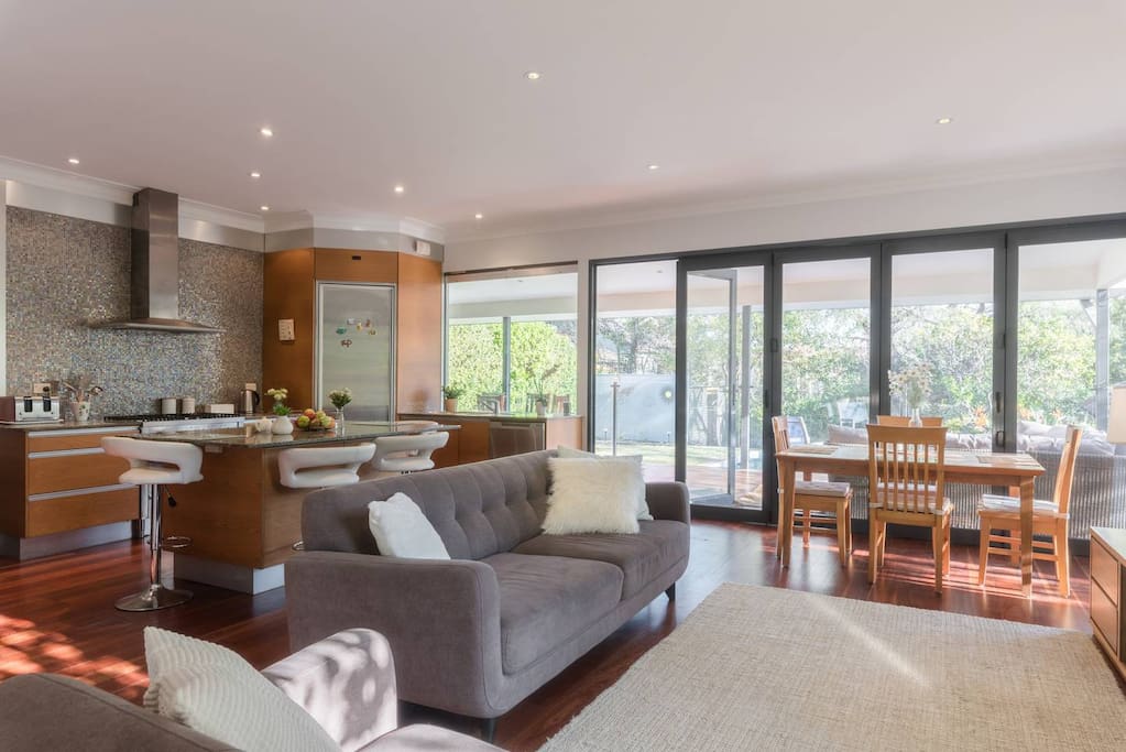 Sun-filled lounge with an open-plan kitchen