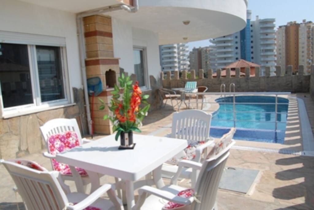 Swimming pool with barbeque