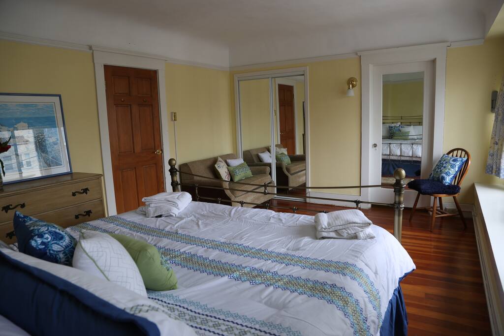 Sunrise Bedroom has sofa and chairs for relaxing! Also private storage