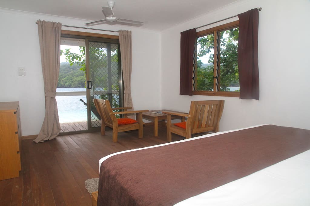 Bedrooms are spacious with lagoon views and locally made hardwood furniture.
