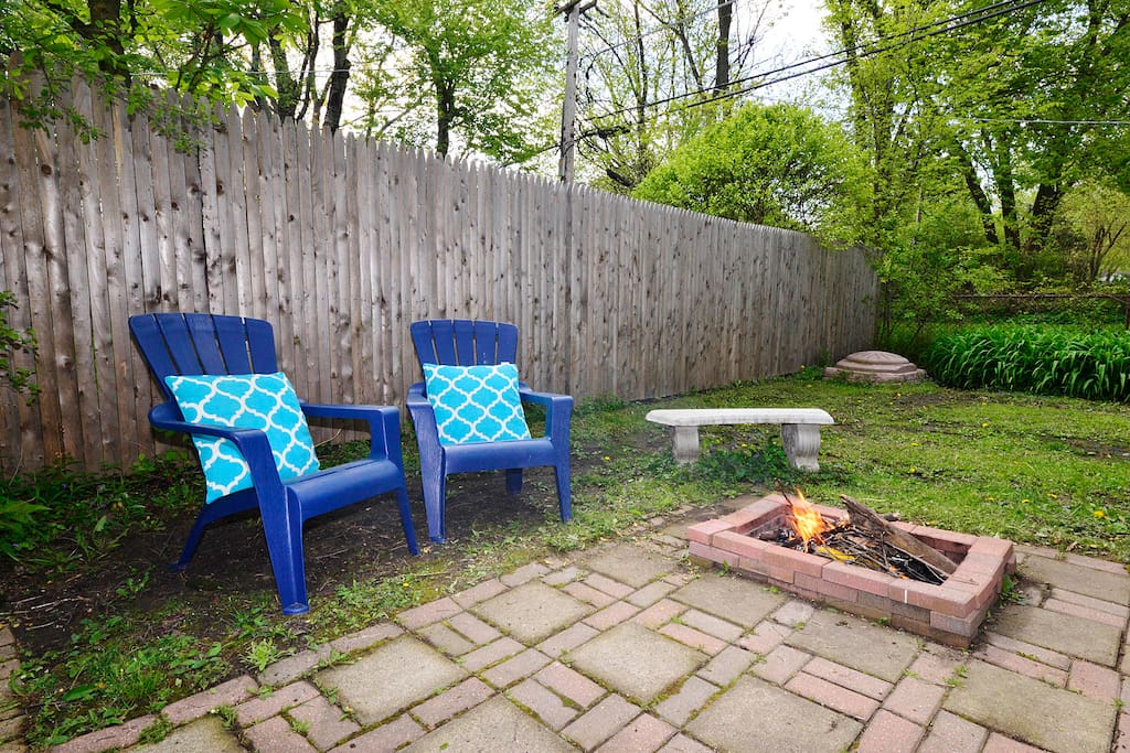 Backyard with firepit and sandbox