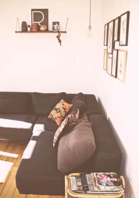 Living includes one big corner sofa with TV