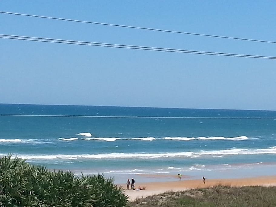 Watch your family enjoy the beach from the comfort of the AC in the living room.