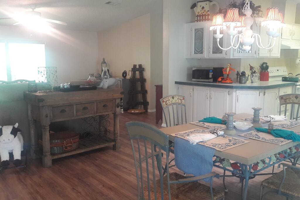 From front door looking into Living Room, Dining Room and partial Kitchen view