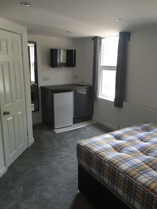 En suite room with Smart TV, Wifi and private fridge
