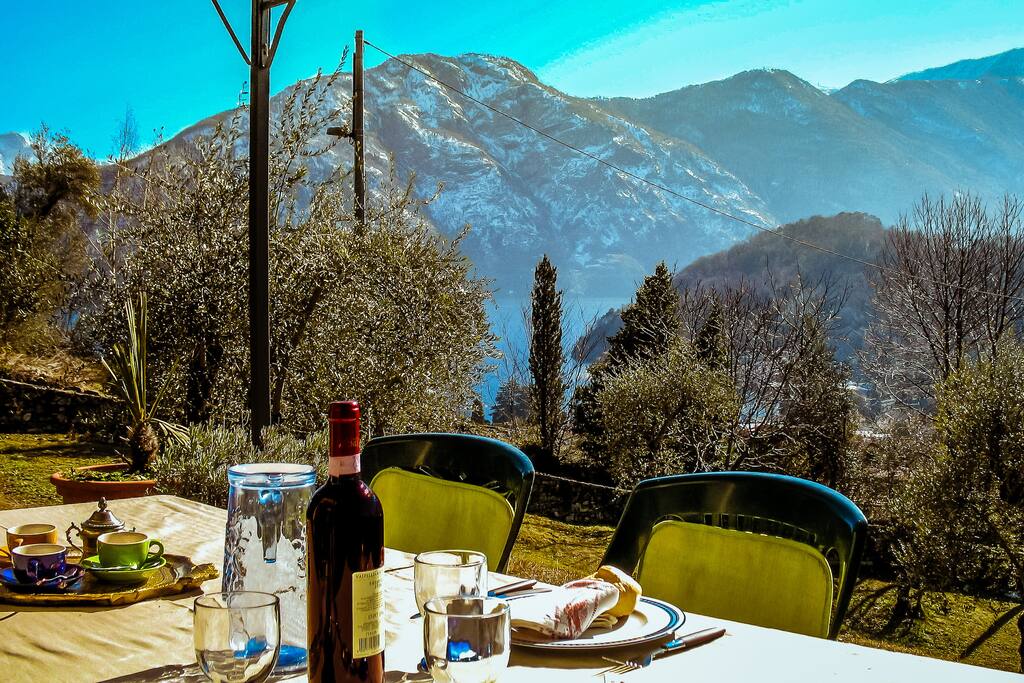 Outdoor dining with lake and mountain views