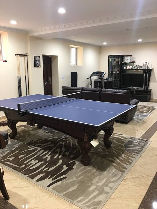 Ping pong table and pool table in common area