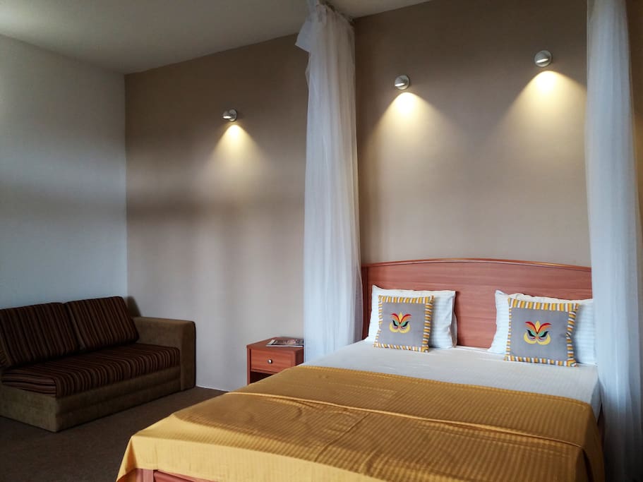 Carpeted Floor, Sofa & Comfy Bed