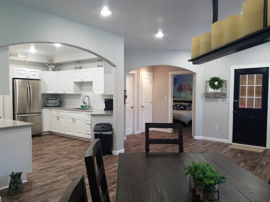 Farmhouse dining table in open kitchen/dining space