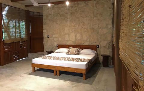 Popular Airbnb listing: Noche Azul cabin with cenotes and pool in Luis Donaldo Colosio