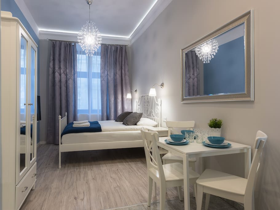 Dining area and double bed.