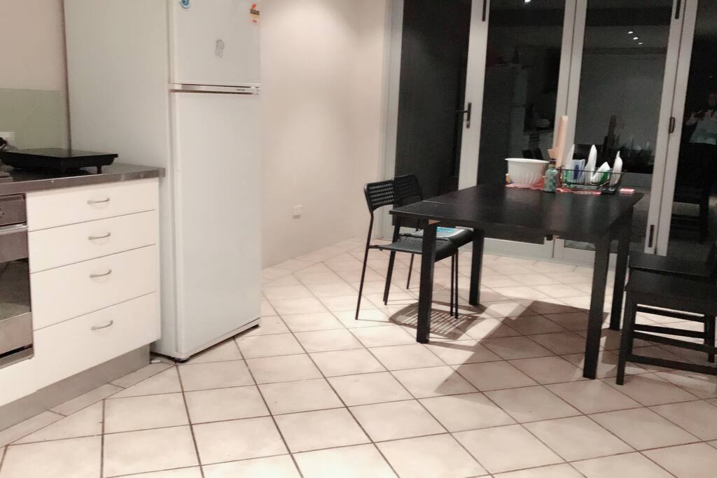 kitchen: Fully equipped kitchen with an oven, induction cooker, dish washer, and pans, utensils, etc.