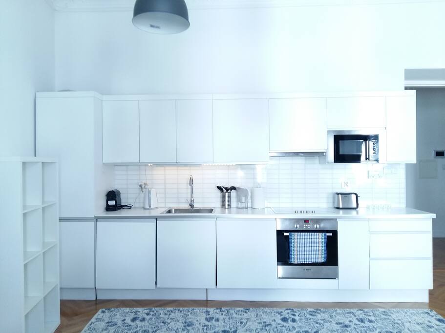 A kitchen connected with living room