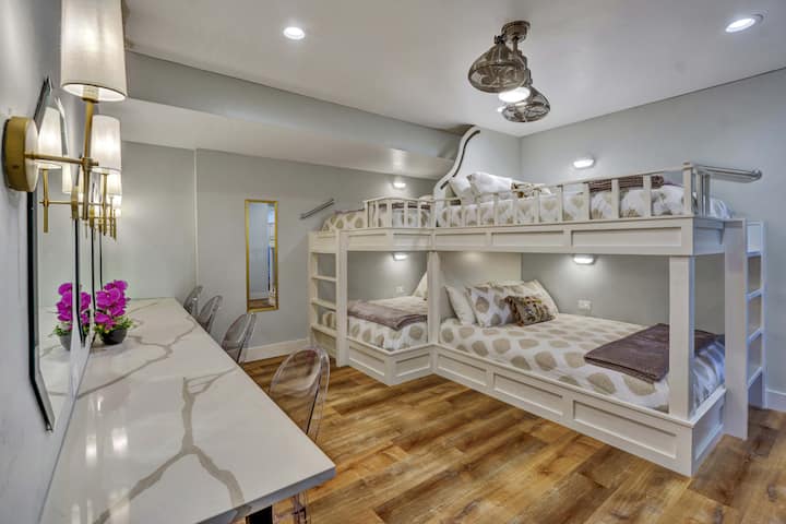 Bunk room with 4 full beds