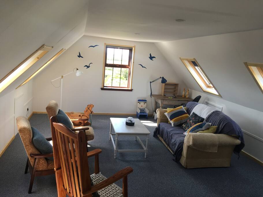 Upstairs living space with 360’ views of the sea, Hook lighthouse, Waterford harbour, Dunmore east, mountains, Slade castle, Baginbun.