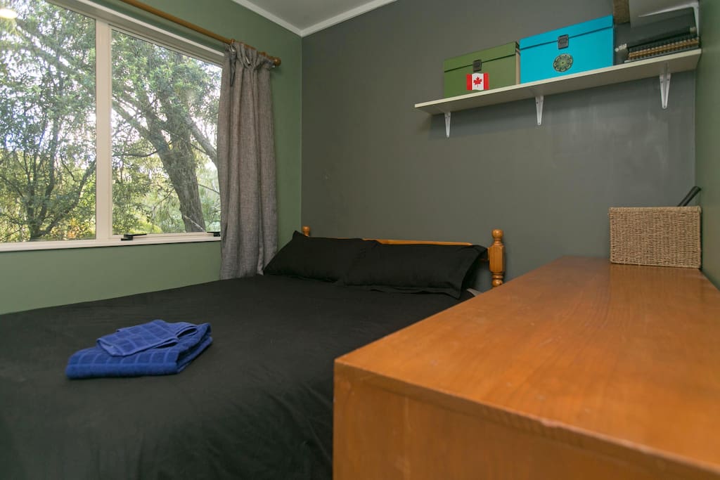 Double bed in small room, no drawers nor closet space