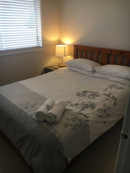 Main room with queen bed.