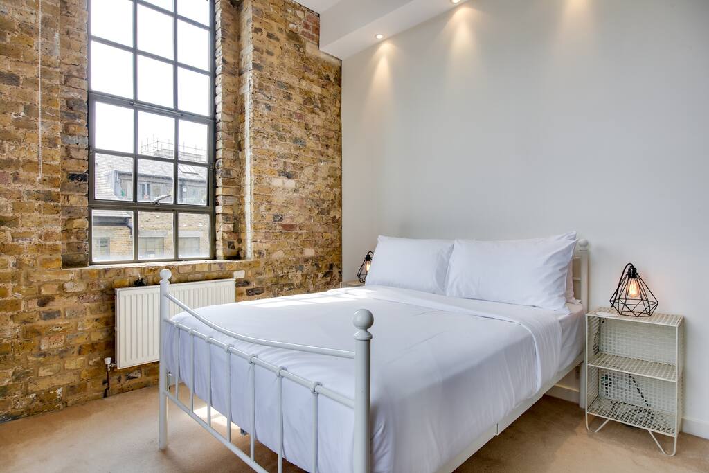 The second bedroom has another luxurious double bed.