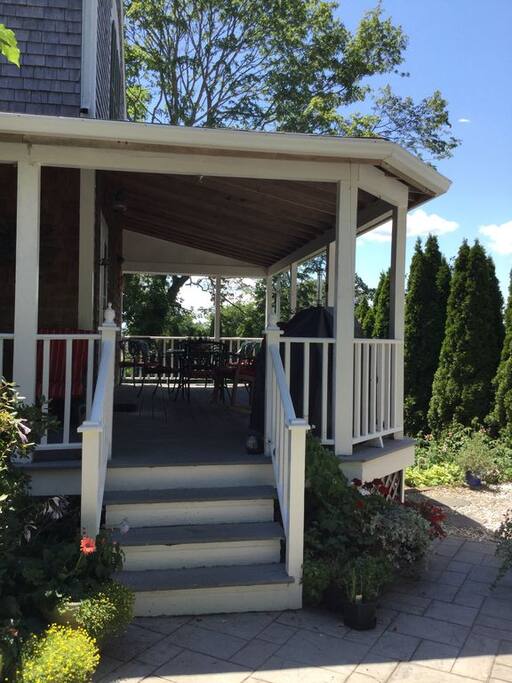 Wraparound porch large enough for outdoor dining.