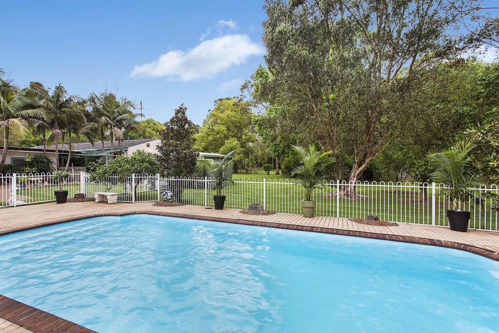 Enjoy summer time by dipping into a sparkling swimming pool