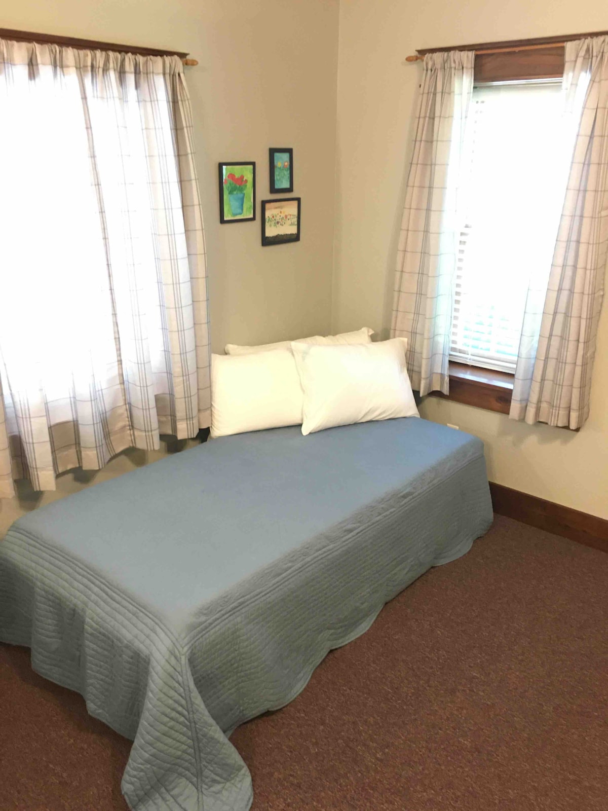 Daybed is located in the common space. This bed is stacked twin beds which can be used individually or pushed together to form a King size bed. Please note that the beds sit close to the floor, more like a platform bed.