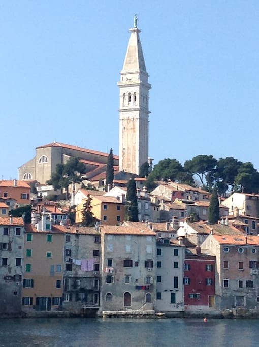 St. Euphemia Church and our building. It's the one with a rounded door in the center and windows, on the ground floor.