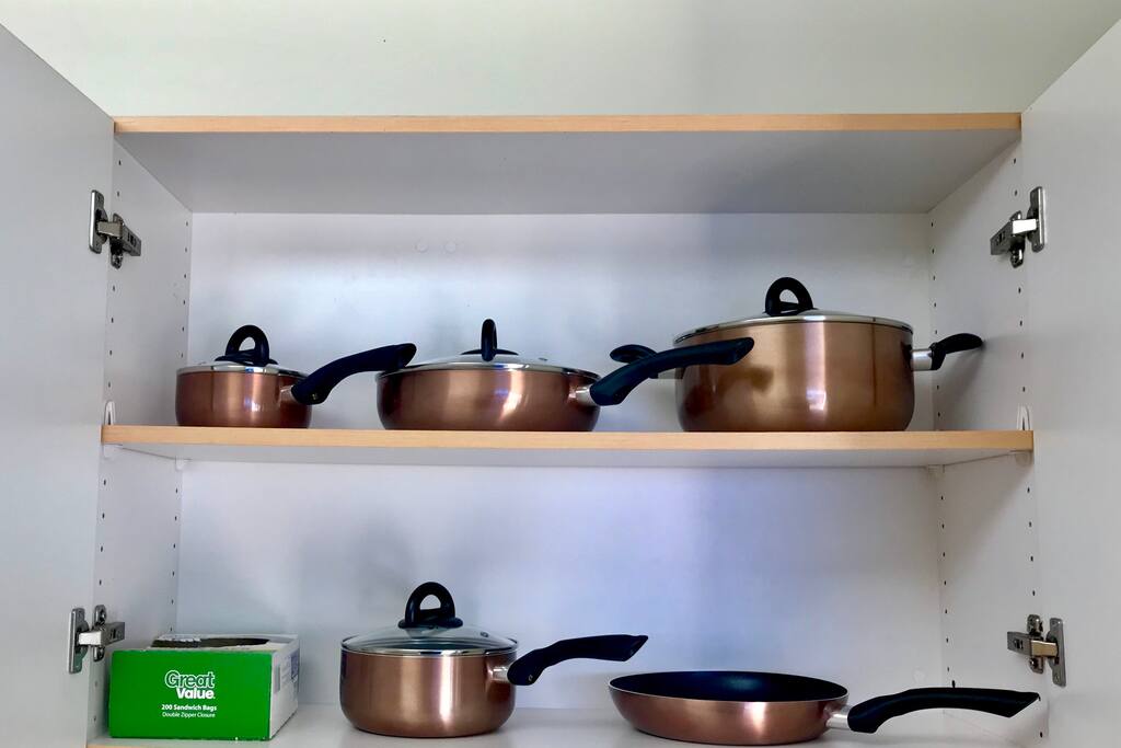 Pots and pans for your use in the common kitchen/laundry room.