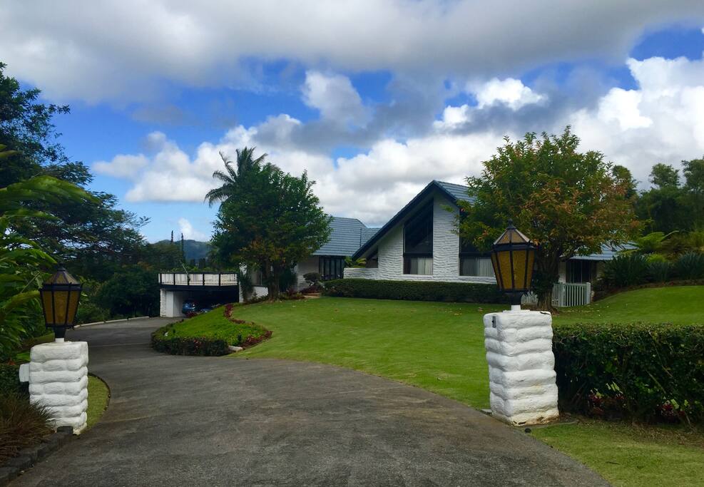 Front view - entry and large lush front yard!