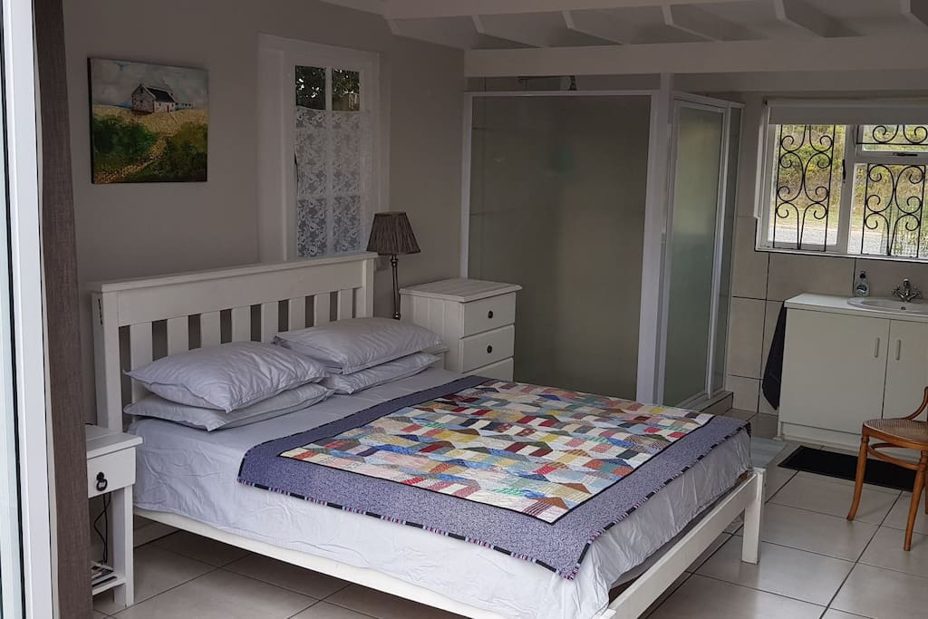 Queen size double bed and lovely big shower.