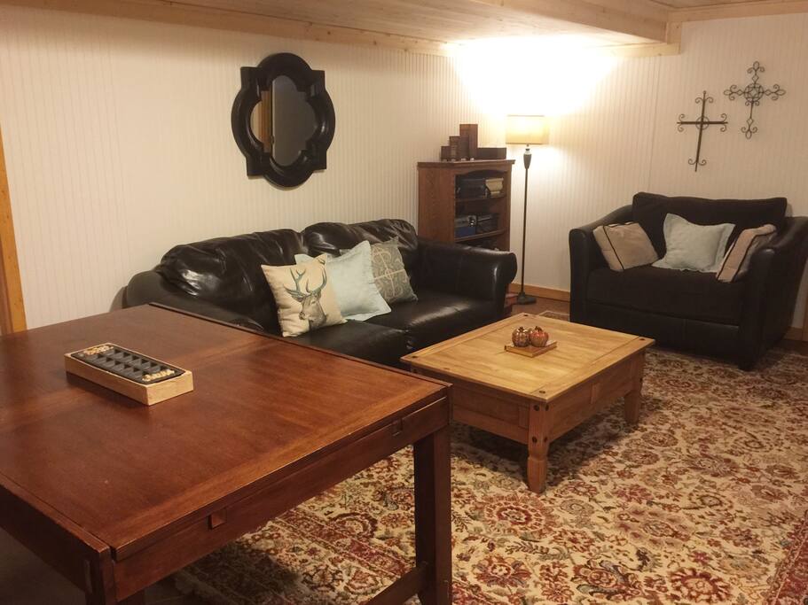 Common area for all guests with ample seating for relaxing or watching movies on the big screen!