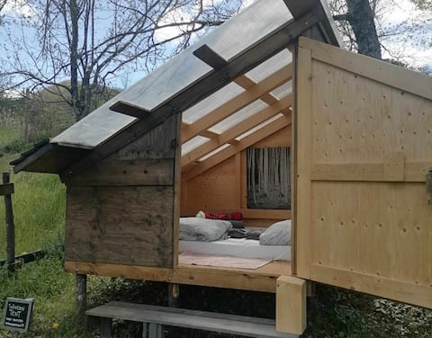 Wooden Tent for sleeping in the woods