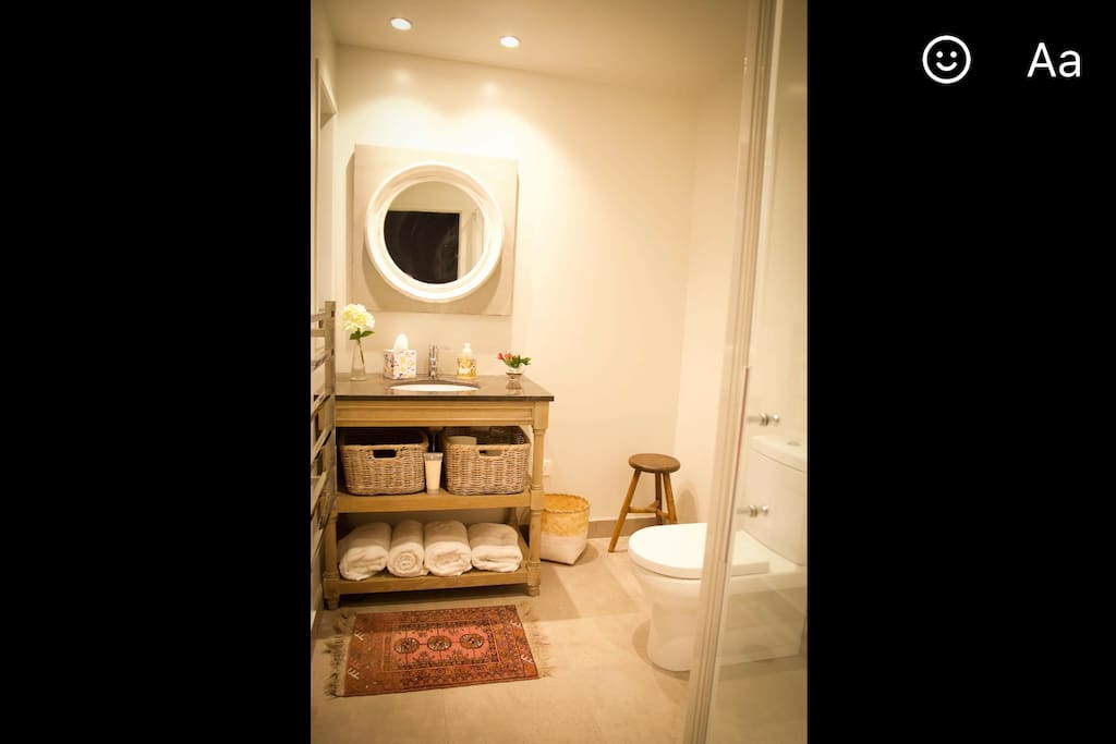 Heated floors and heated towel rail make this fully equipped bathroom very cosy. Quality toiletries.