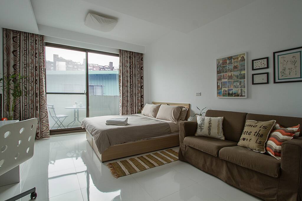 Big balcony doors letting in lots of natural light.