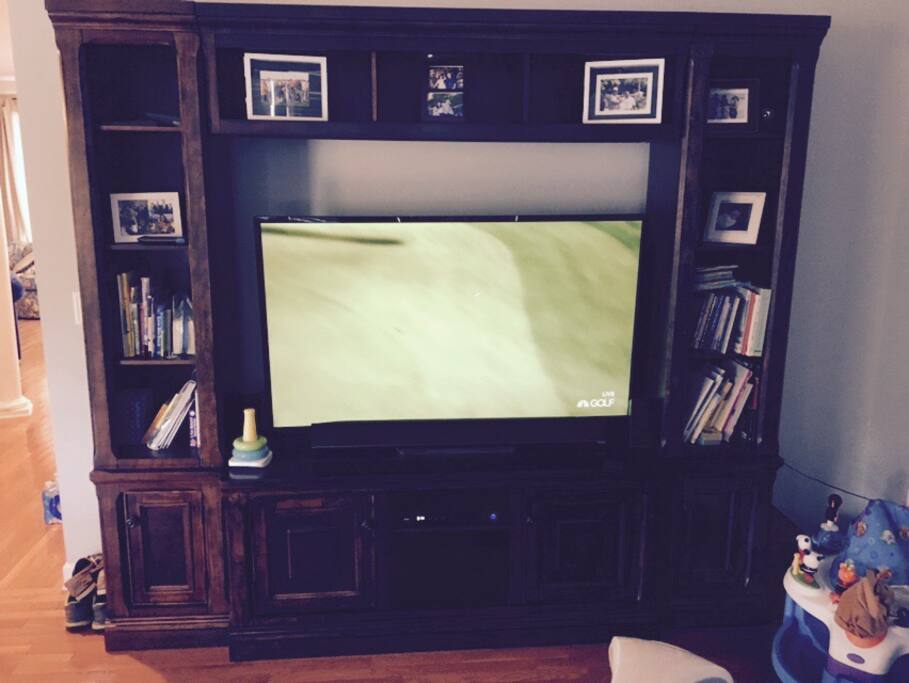 Living room with 60' TV (next to kitchen)
