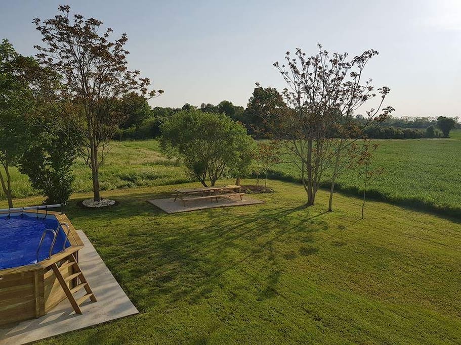 The rear garden directly adjoins The Marais Poitevin and benefits from a heated swimming pool, oudoor seated dining area under the natural shade of the trees, a large level lawn area and facing directly west to maximise those long sunny days.