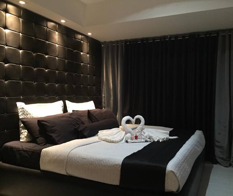 Relax on a luxurious California king size bed.