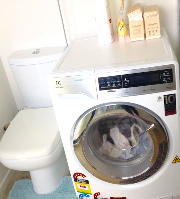 Bathroom and laundry area- washer dryer combo in one