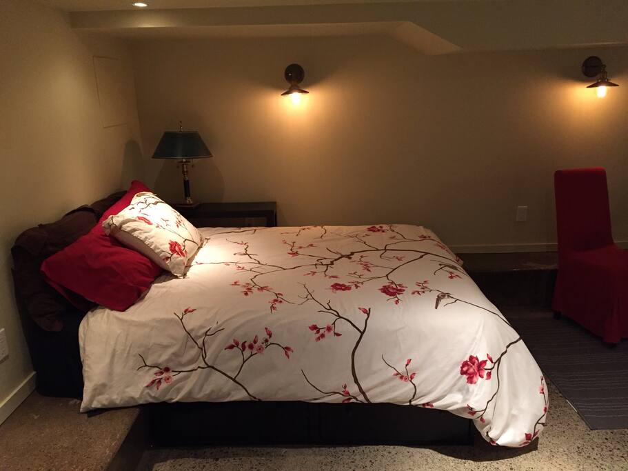 Extremely comfortable queen-size bed with goose-down comforter and pillows.