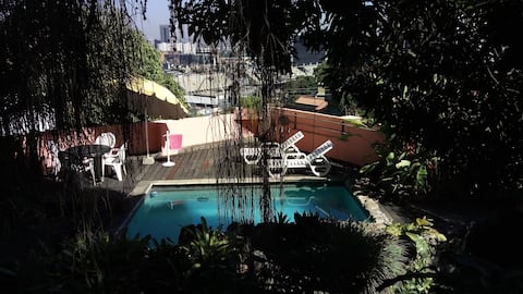 independent apt. in tropical garden with pool