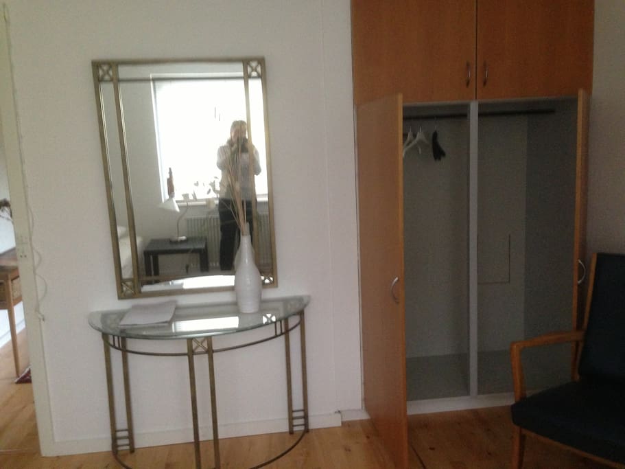 The cupboard for your clothes, and a mirror.